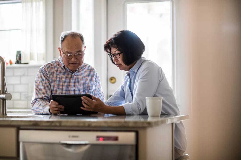 two people using a tablet.jpg