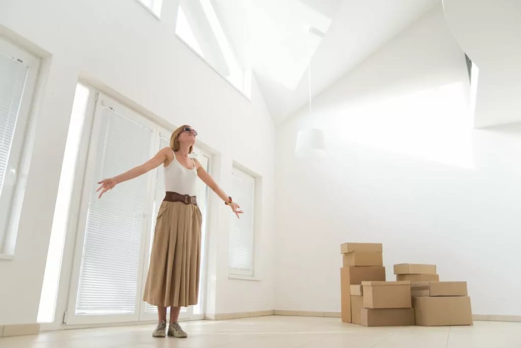 woman and boxes in new home.width .jpg