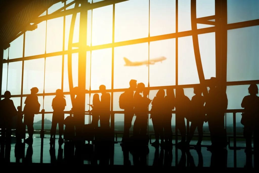 Crowd at an airport pwHBMV.width .jpg