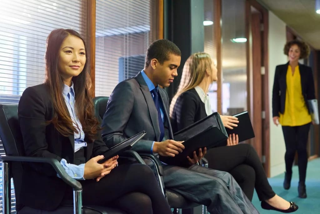 Job applicants waiting for interview IOERt.width .jpg