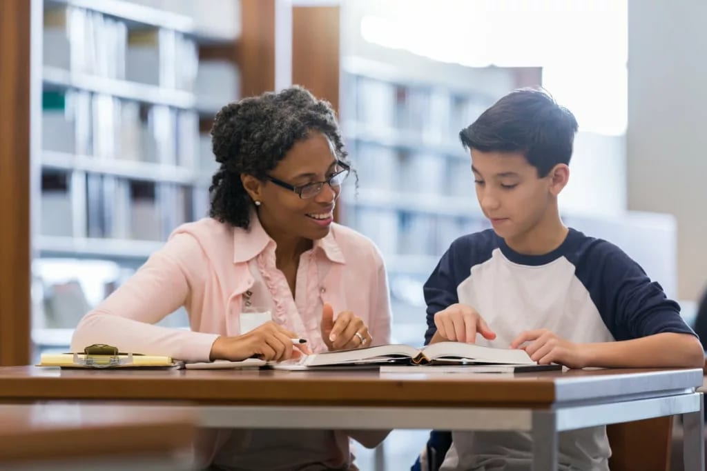 Tutor working with student SRTstck.width .jpg