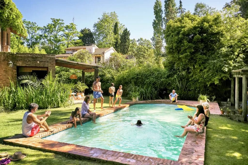 family in backyard pool zlntaK.width .jpg