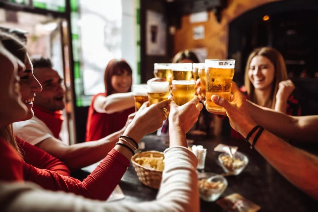 group of friends at happy hour rrhrdM.width .jpg