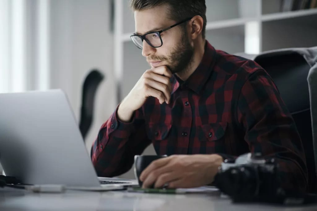 man s at desk serious gettyimages .jpg