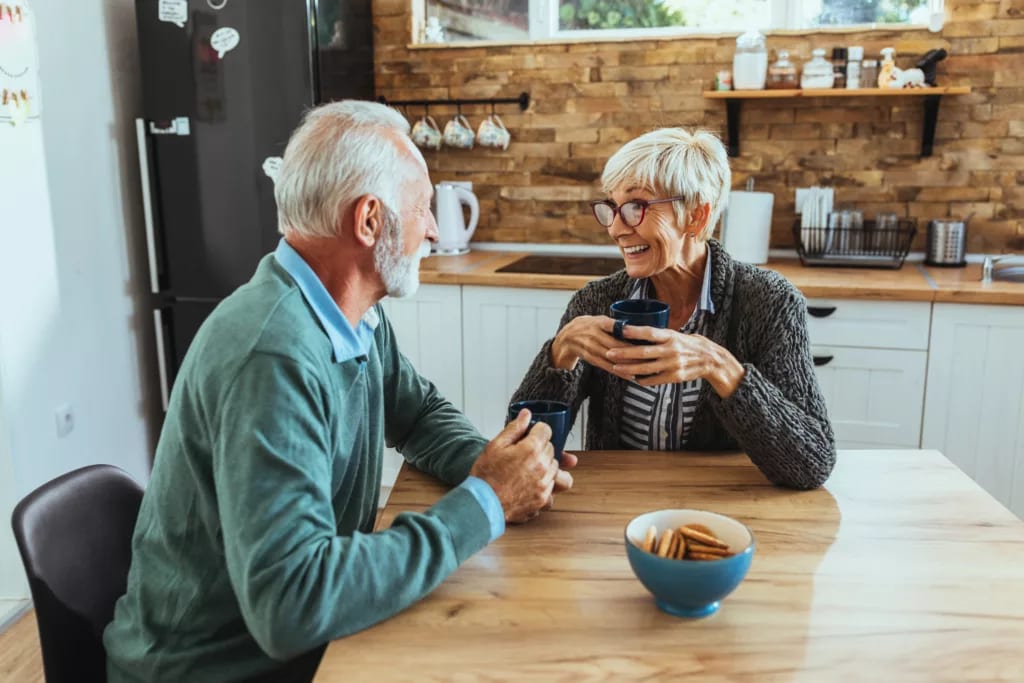 senior couple kitchen table gettyimages .jpg