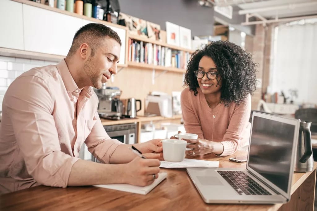 couple go over personal finances oyLcmHJ.width .jpg