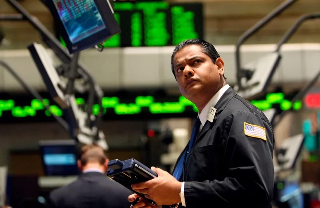 getty images man on the floor of a stock exchange.jpeg