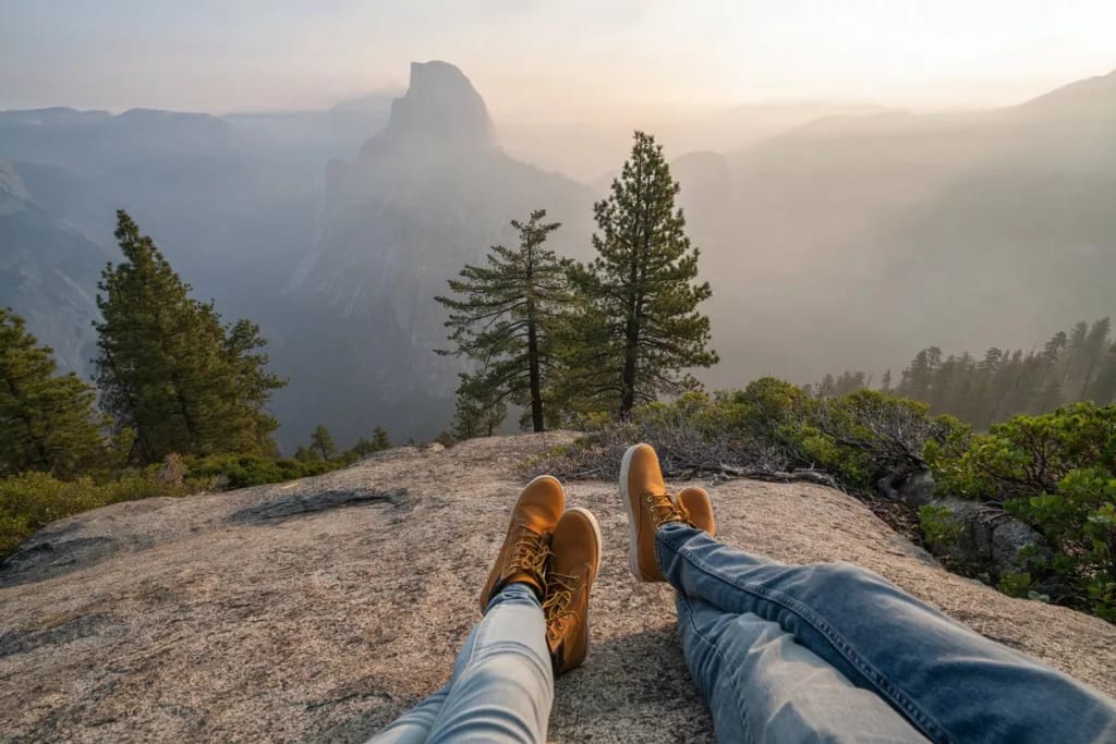 two people lying on rock in yosemite JnYs.width .jpg