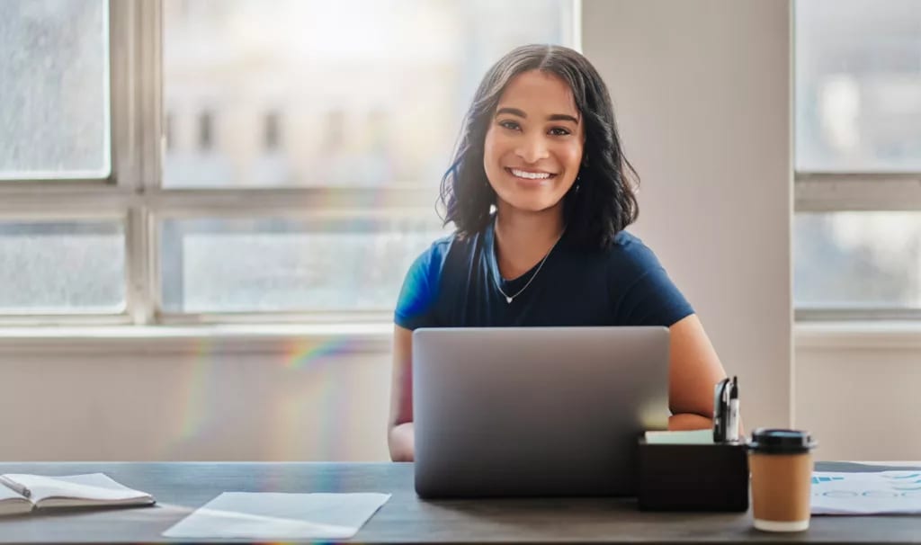 woman s laptop happy gettyimages .jpg