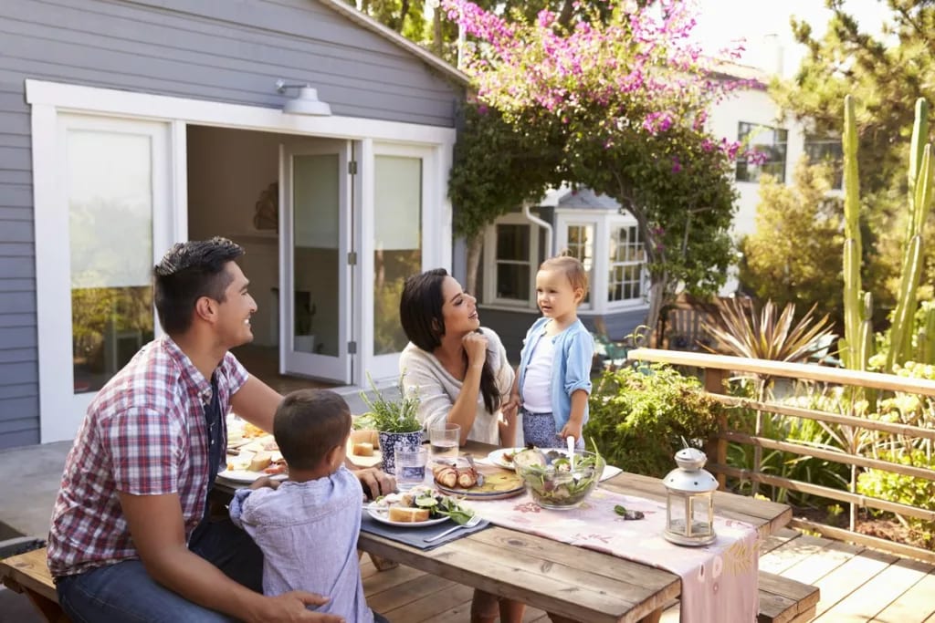 Happy family in backyard KkCbM.width .jpg