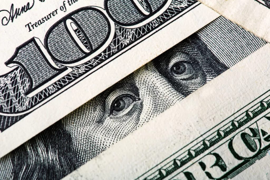 folded money cash invest retire social security treasury getty.jpg