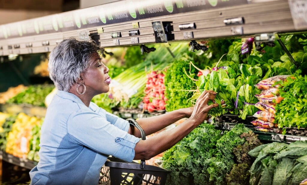 senior woman produce aisle gettyimages .jpg