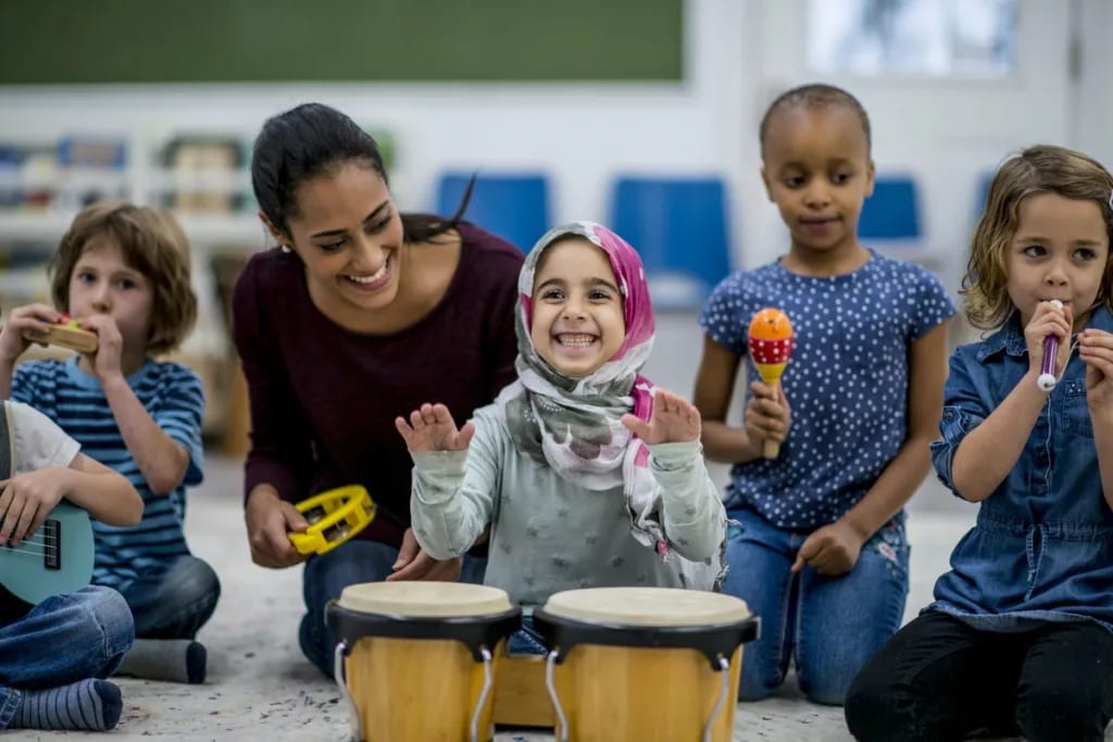 toddlers at daycare with instruments.width .jpg