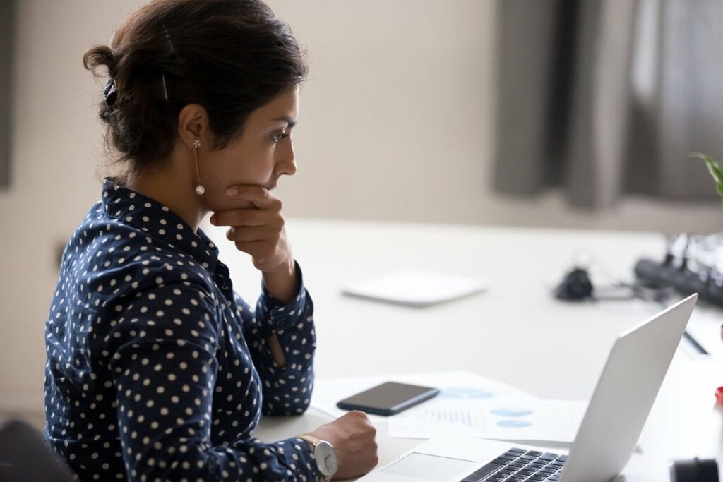 worried woman with laptop.width .jpg