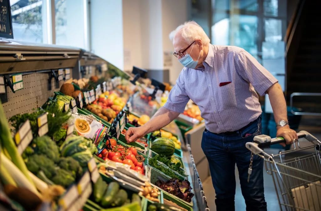 Older man shopping at grocery store CODDjp.width .jpg