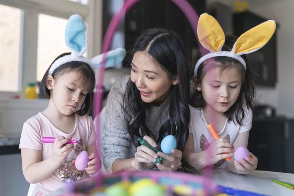 adult and kids with easter eggs BfuBs.width .jpg