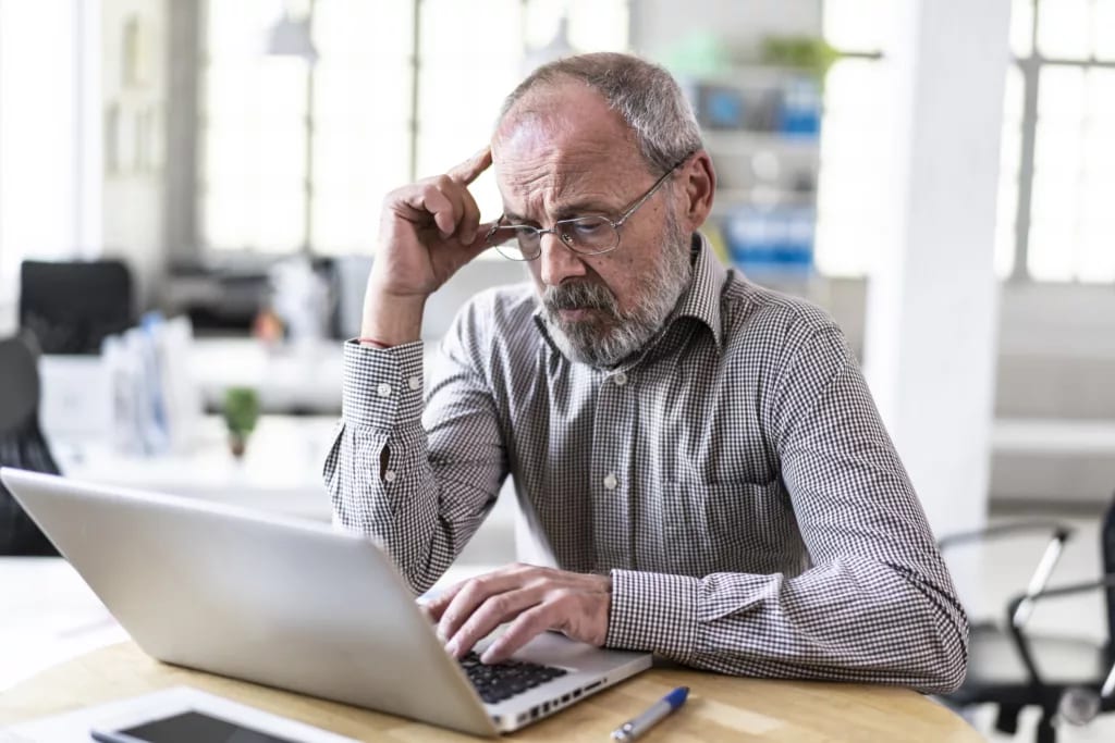 senior man laptop gettyimages .jpg