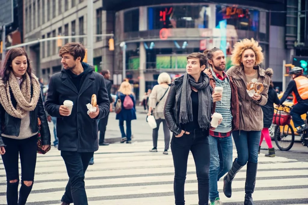 People walking across busy NYC street pSxKq.width .jpg