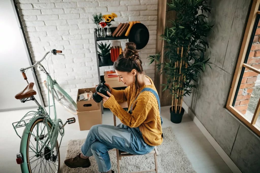 woman with camera and bike inside.width .jpg