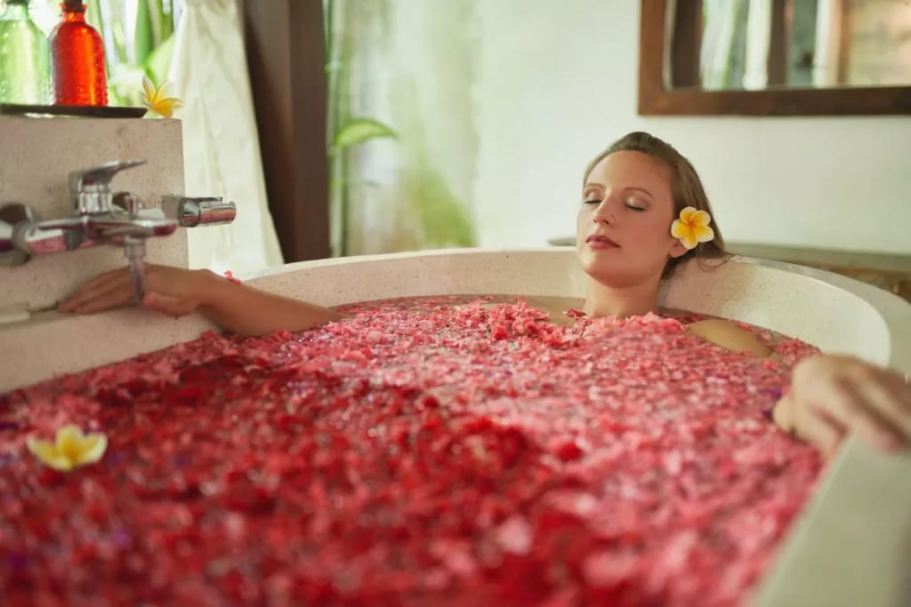 Woman relaxing in a soaking tub jbzLmS.width .jpg