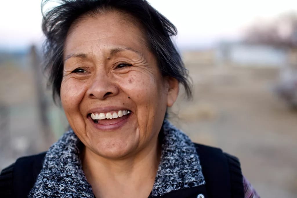getty happy smiling person outside.jpg