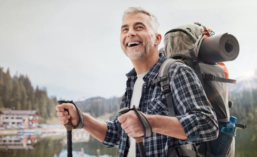 getty hiker outdoors flannel smiling happy.jpg