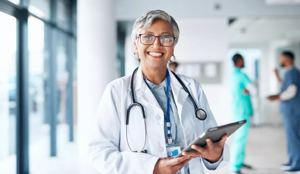 getty smiling doctor healthcare happy.jpg