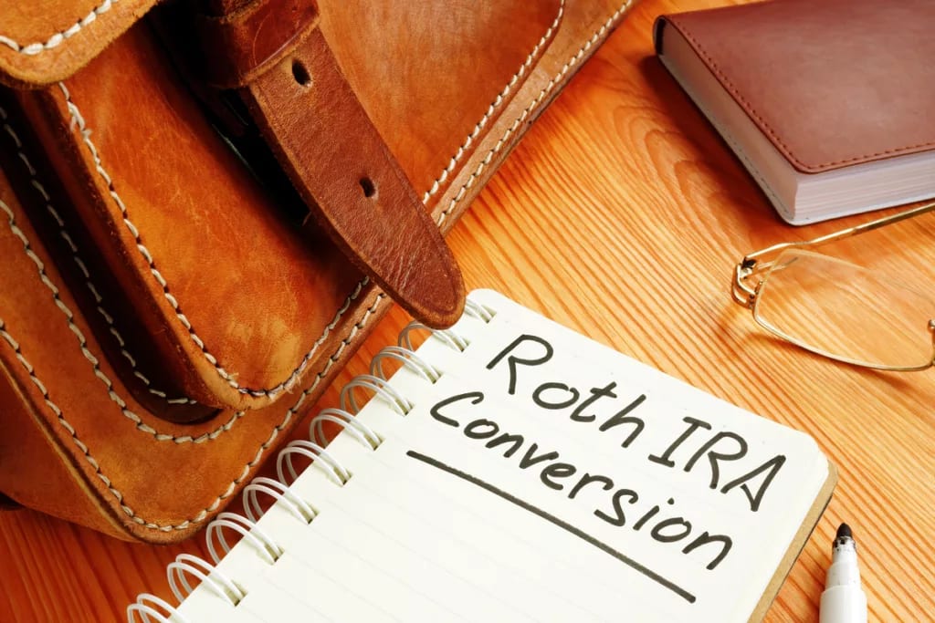 gettyimages roth ira conversion notebook retirement plan.jpg