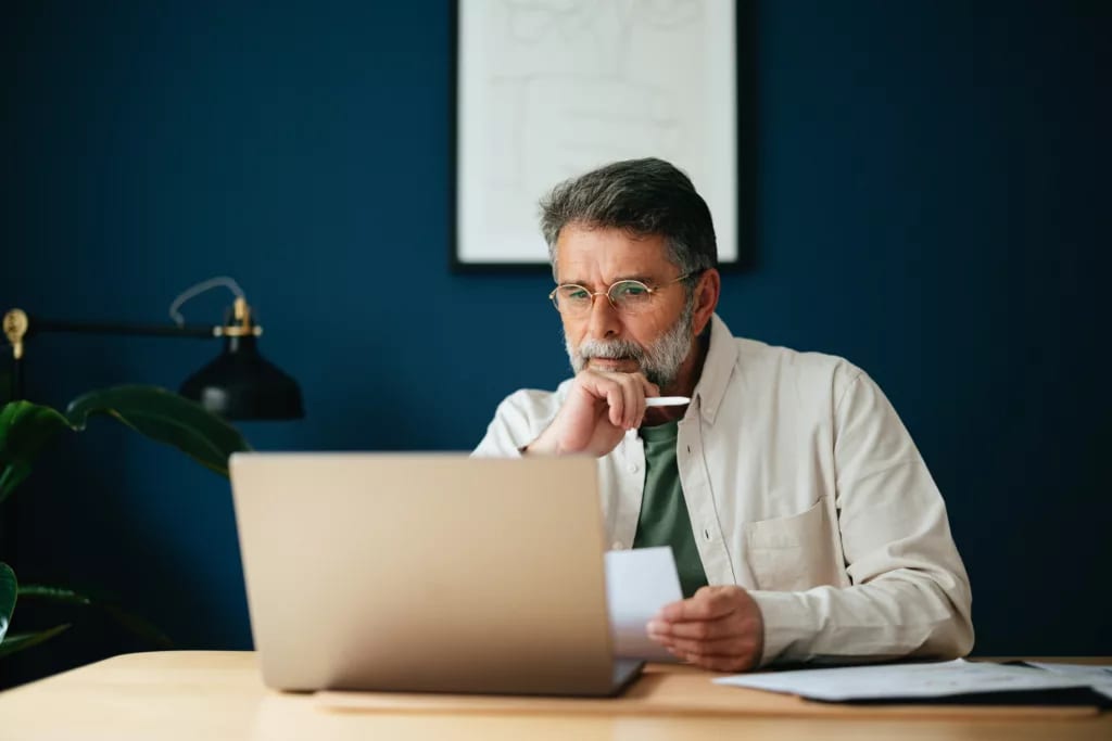 older man laptop gettyimages .jpg