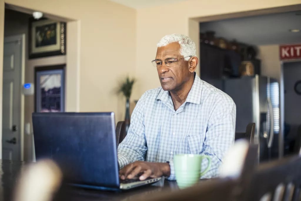 senior man laptop gettyimages .jpg