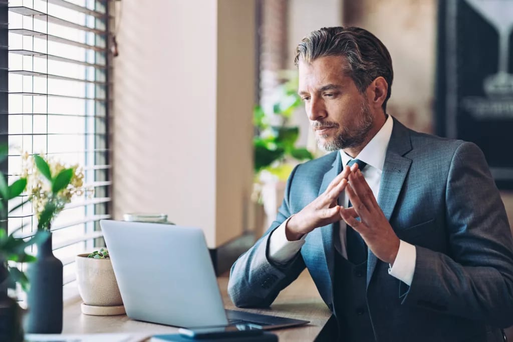 man biz suit laptop serious gettyimages .jpg