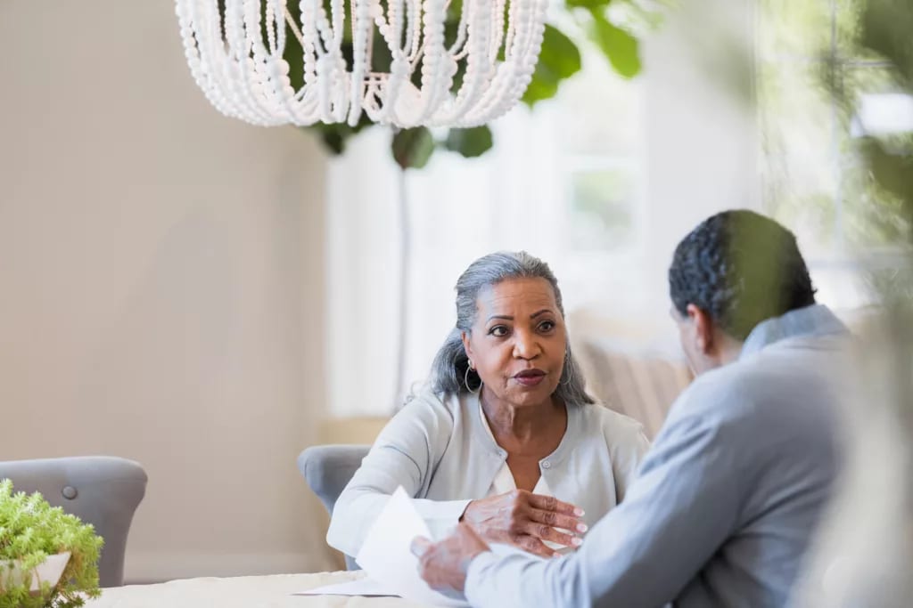 senior couple at table gettyimages .jpg