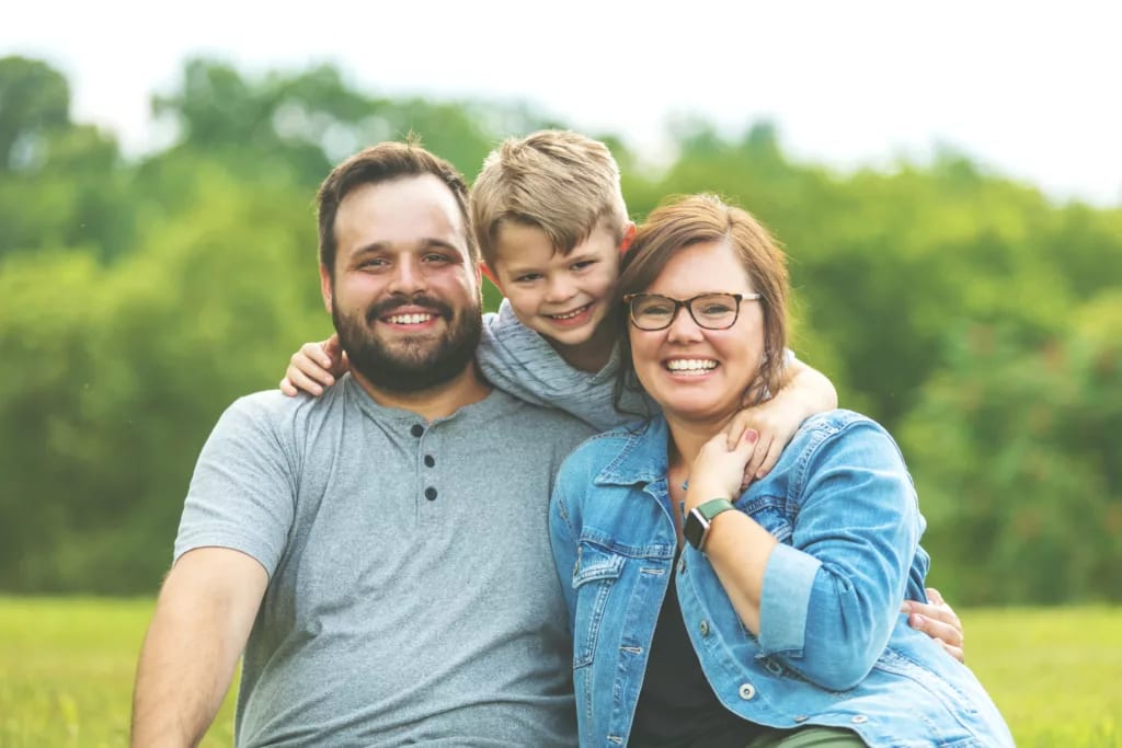 getty family with one kid in park.jpg