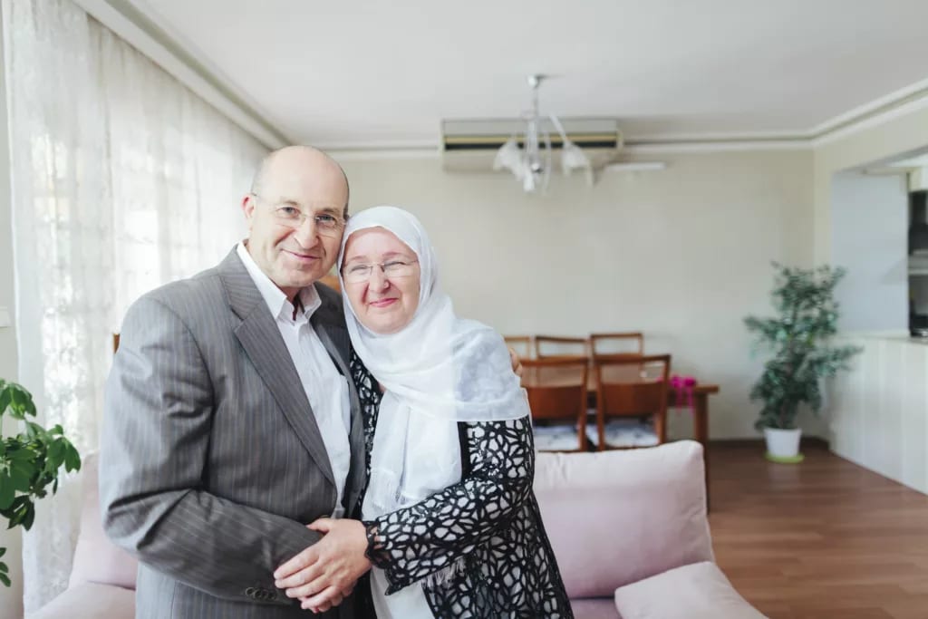 getty smiling couple on couch.jpg