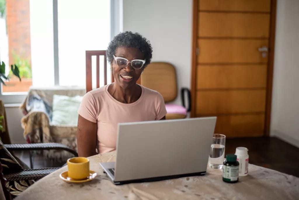 older adult doing research on computer.jpg