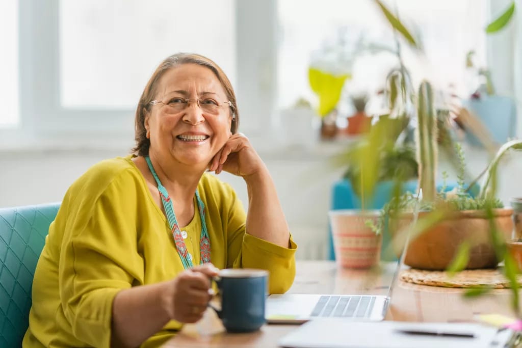 person sitting at a desk and smiling.jpg