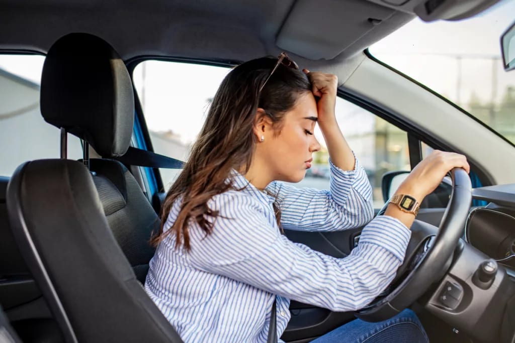 stressed person sitting in car.jpg