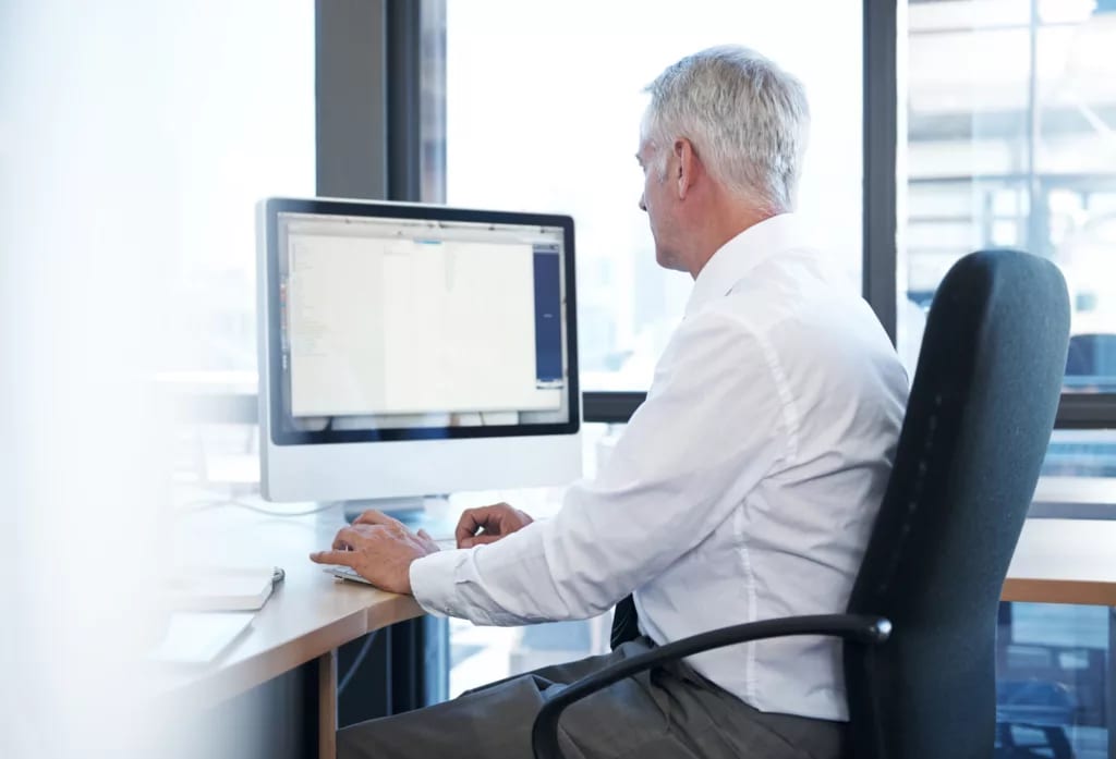 a person at a computer gettyimages .jpg