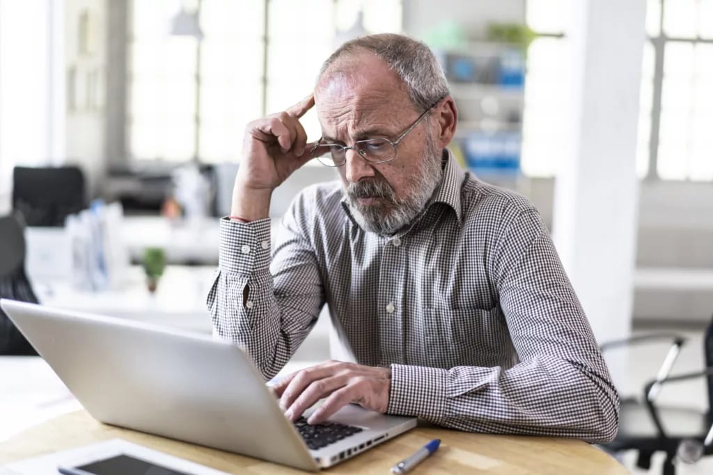 senior man laptop gettyimages .jpg
