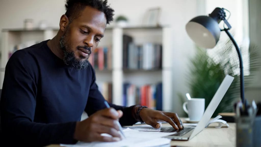 investor reviewing a stock portfolio.jpg