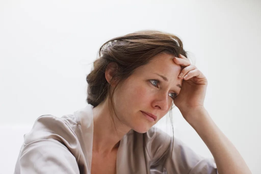 getty sad dismayed unhappy hand on head.jpg