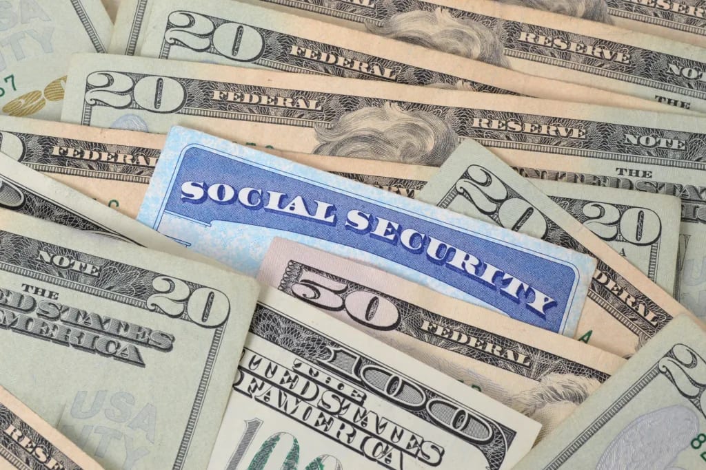 getty social security card and cash.jpg