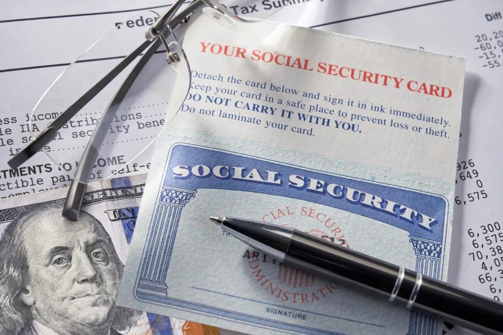 social security card cash money retire benefit tax statement getty.jpg