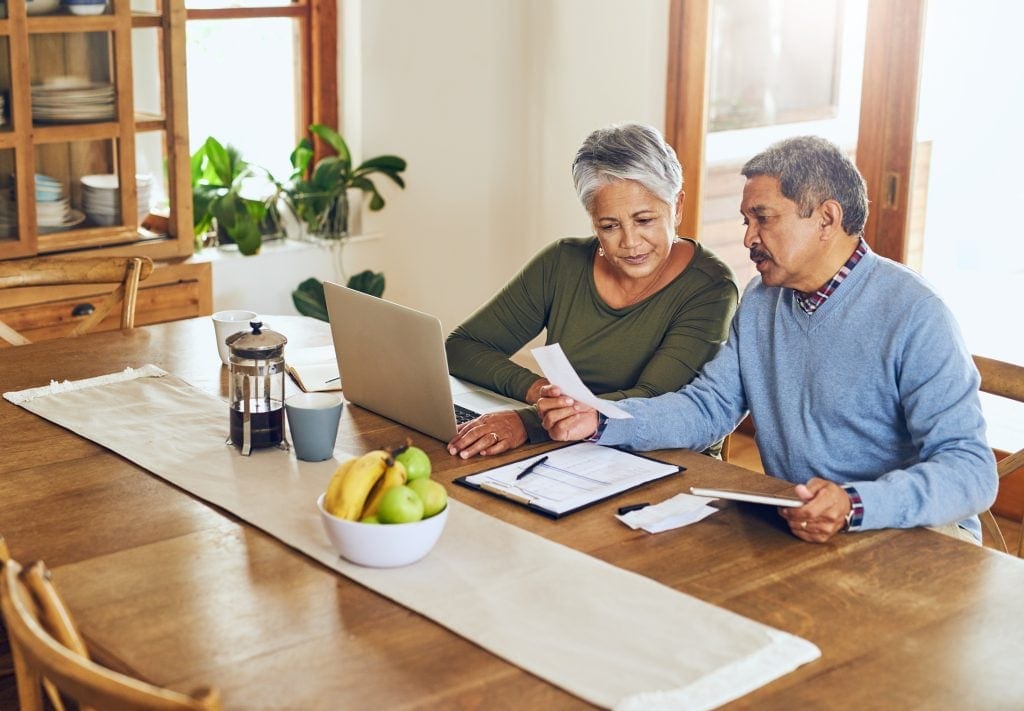 Two people sitting at a table.