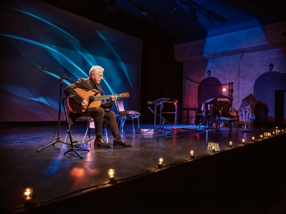 older man guitar stage gettyimages .jpg