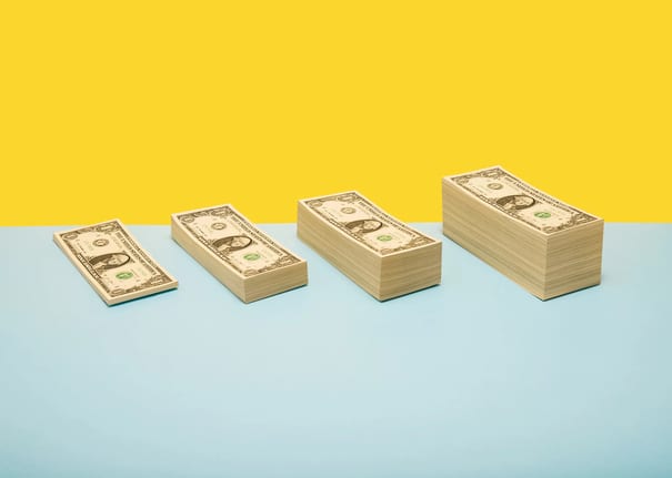 stacks of dollar bills.jpg