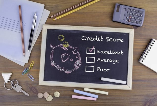 Chalkboard with credit score piggy bank Uagxz.width .jpg