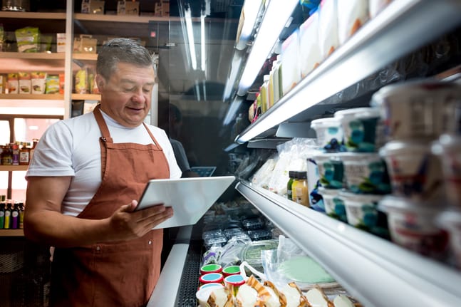 older man food counter ettyimages