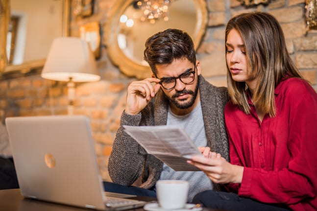couple looking at bills .jpg