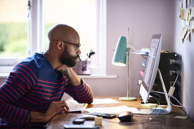 person staring at computer screen.jpg